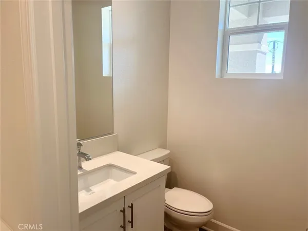 a bathroom with a sink a toilet