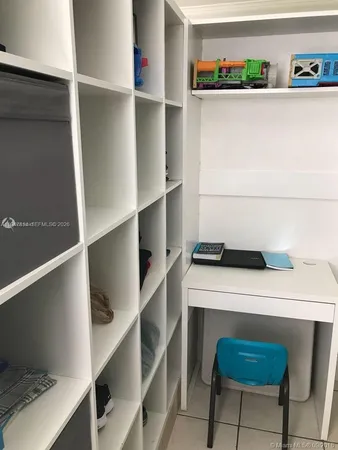 a room with storage and utility