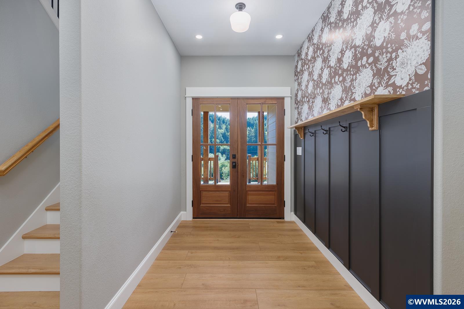 34370 Hawk Hill Road Philomath, OR 97370 - Photo 8 of 50 a view of a hallway with wooden shelves