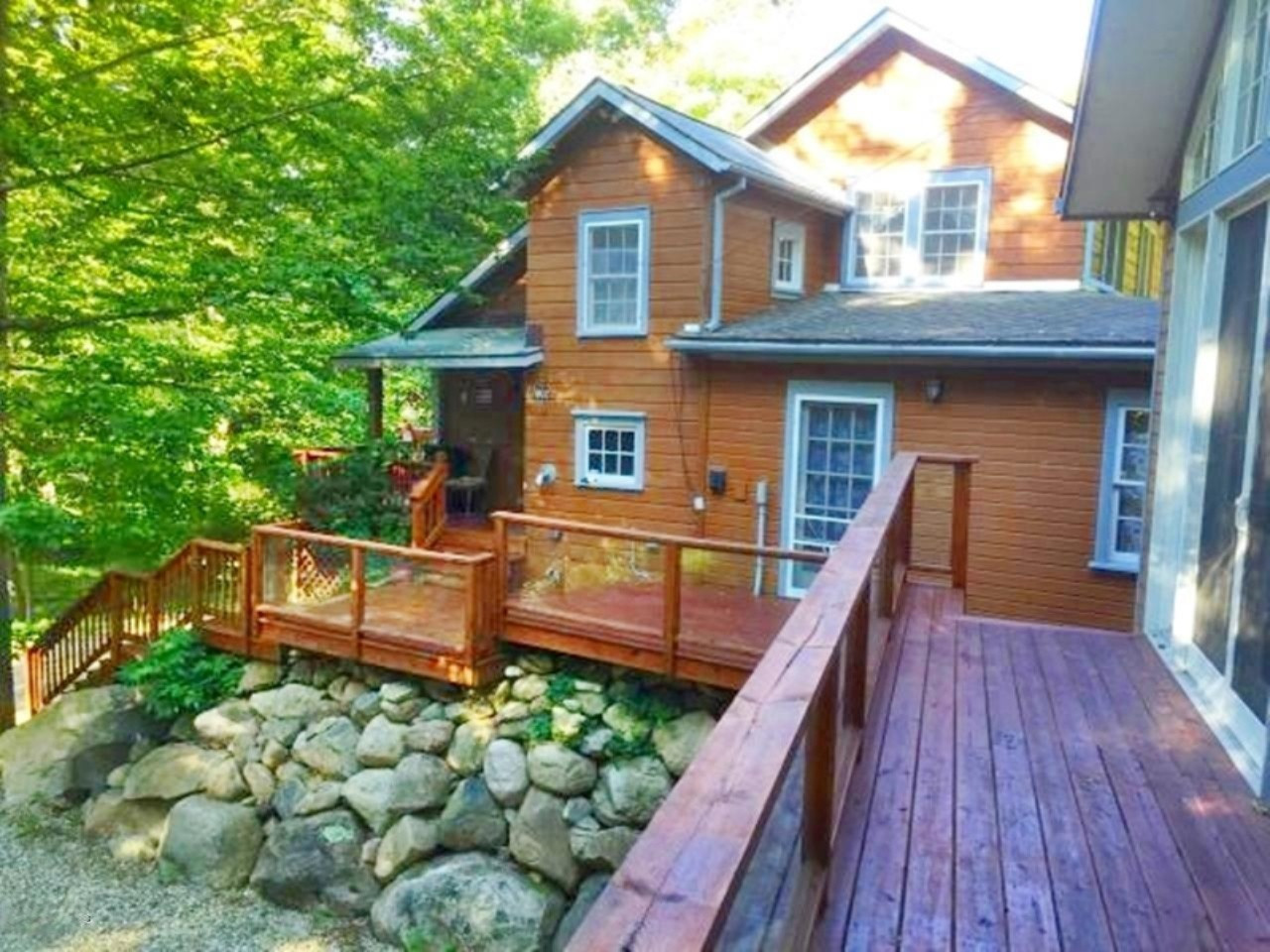 7002 Lakeshore Road Manistee, MI 49660 - Photo 39 of 63 Outside Decking of Second Home