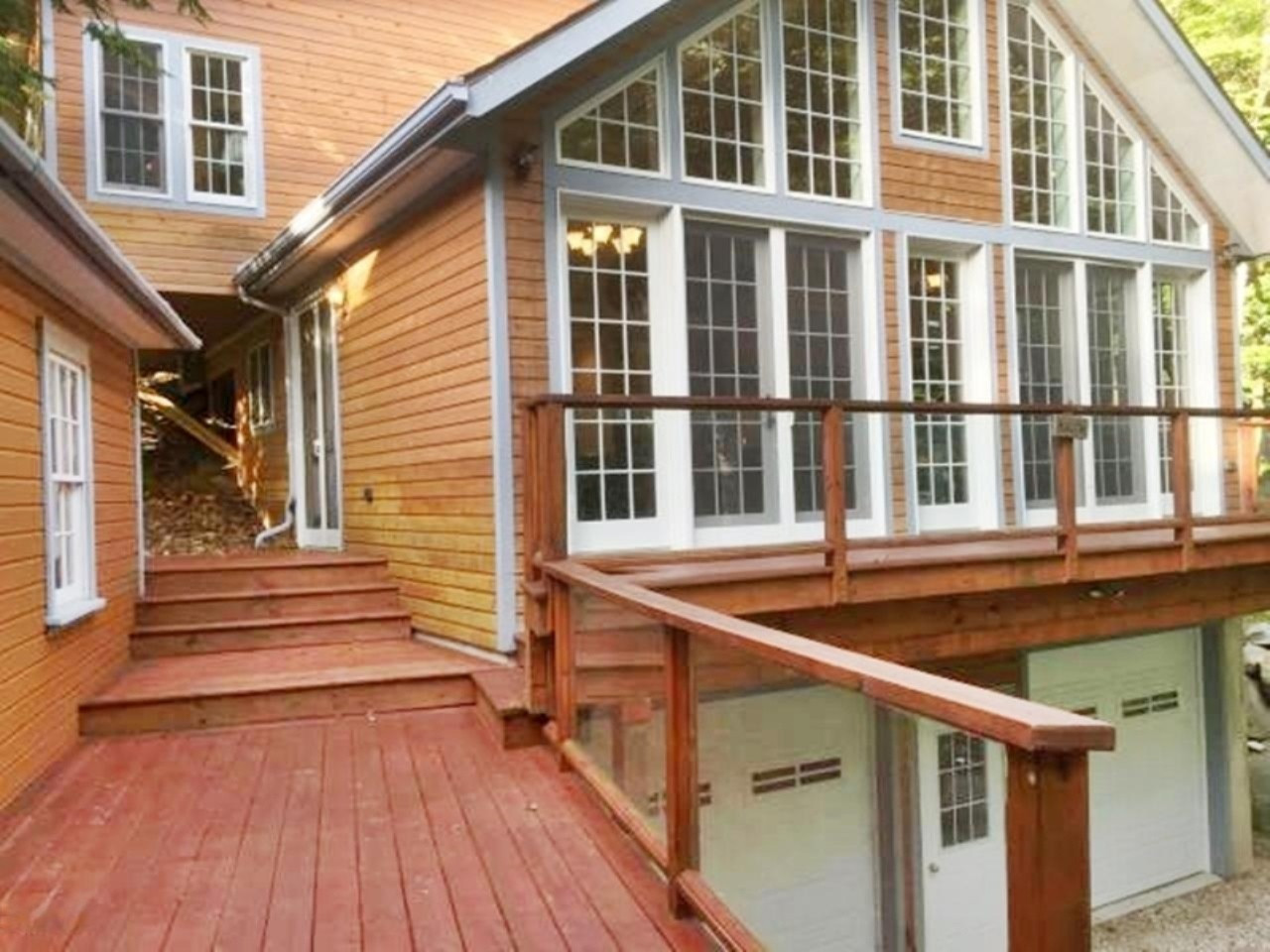 7002 Lakeshore Road Manistee, MI 49660 - Photo 41 of 63 Second Home Wall of Windows