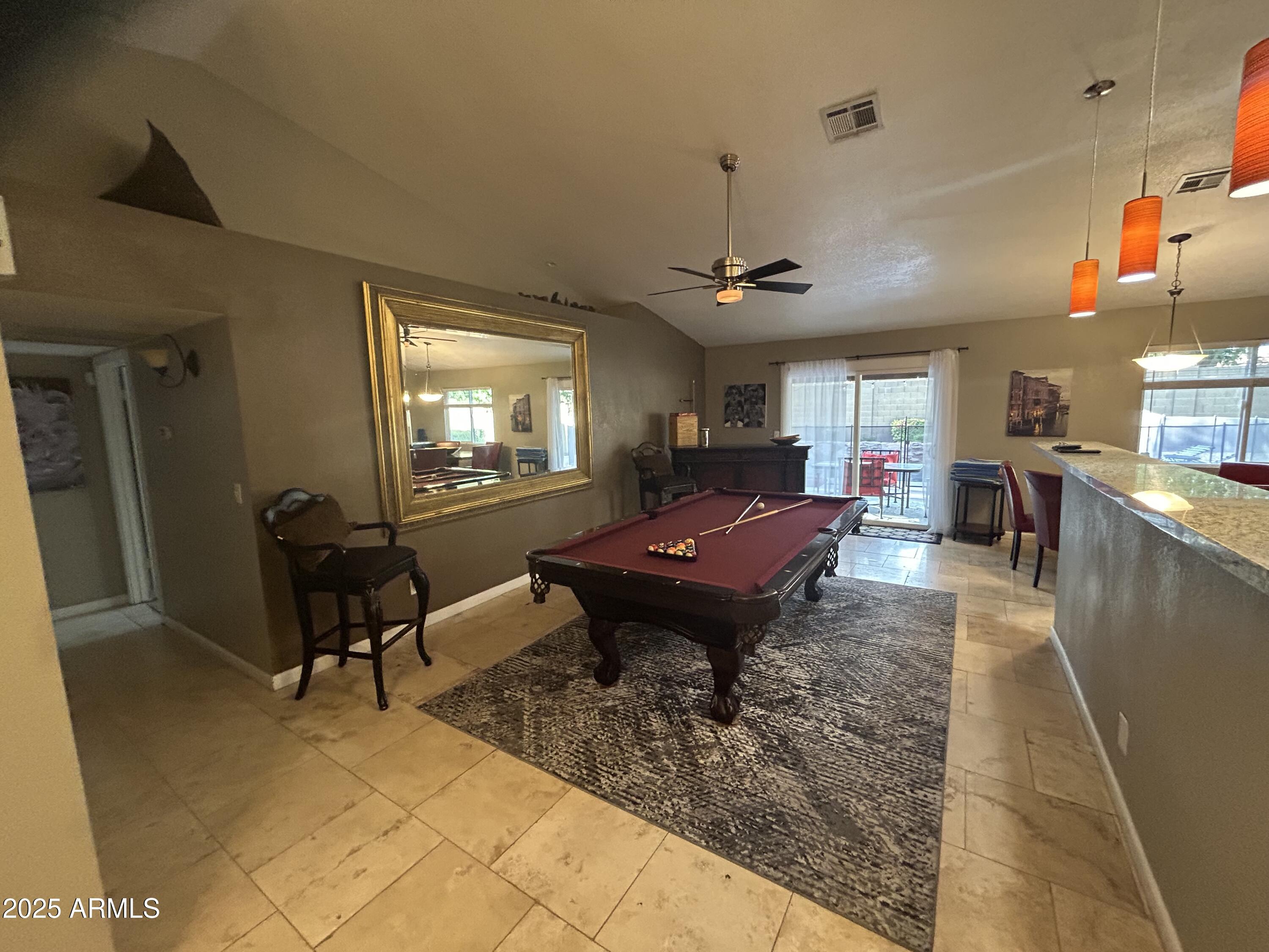 6002 East Beck Lane Scottsdale, AZ 85254 - Photo 12 of 35 a living room with a piano table and chairs