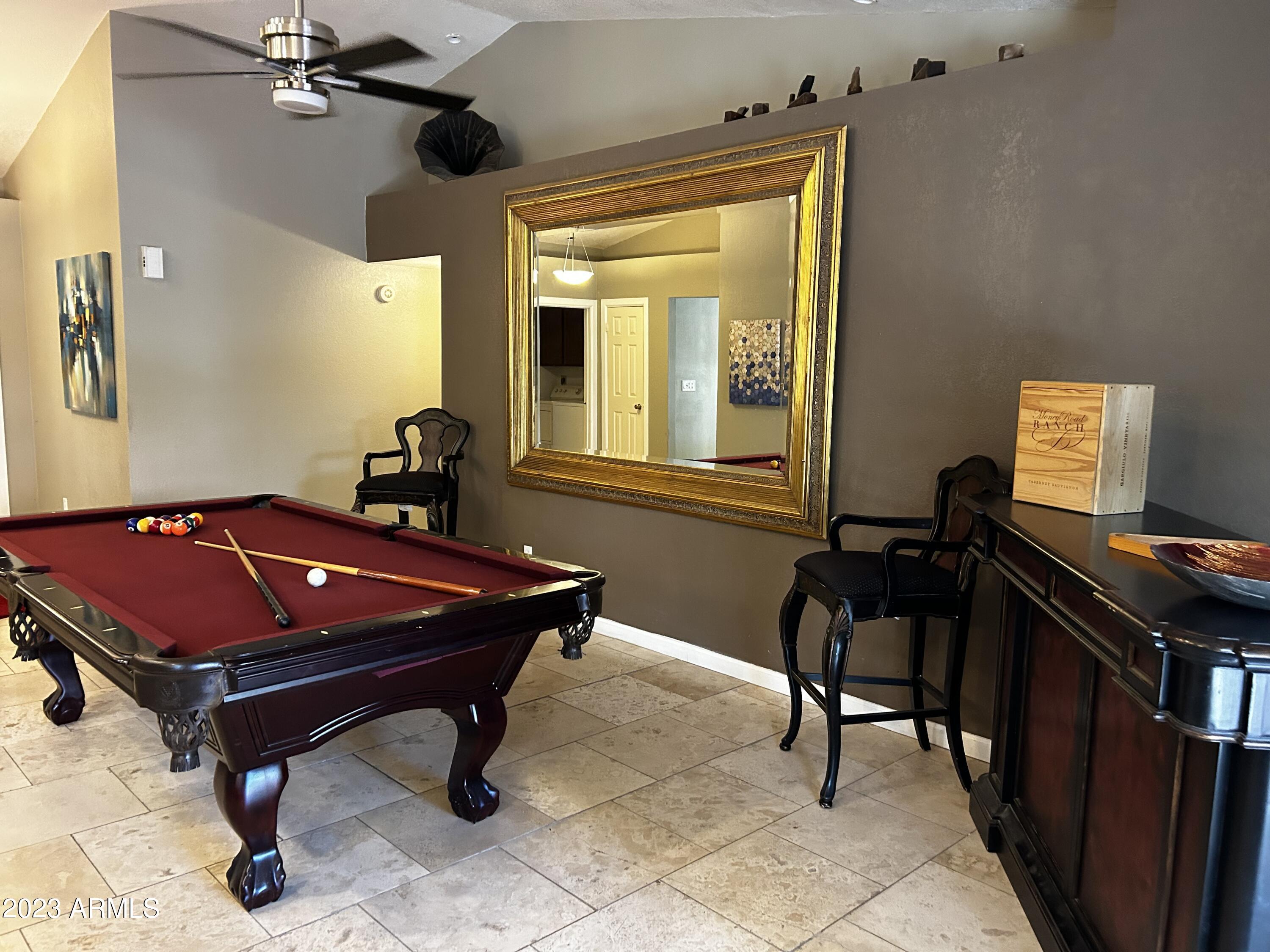 6002 East Beck Lane Scottsdale, AZ 85254 - Photo 14 of 35 a room with pool table and windows