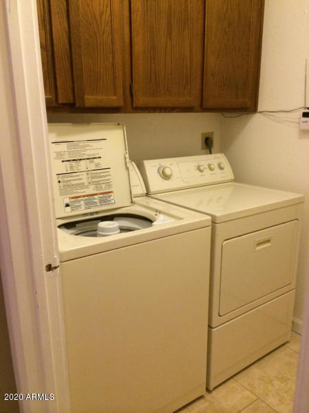6002 East Beck Lane Scottsdale, AZ 85254 - Photo 23 of 35 a utility room with dryer and washer