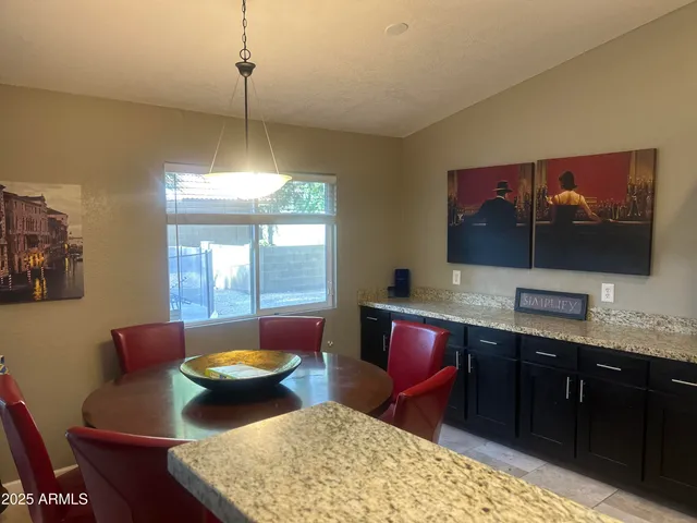 a view of a livingroom with furniture and window