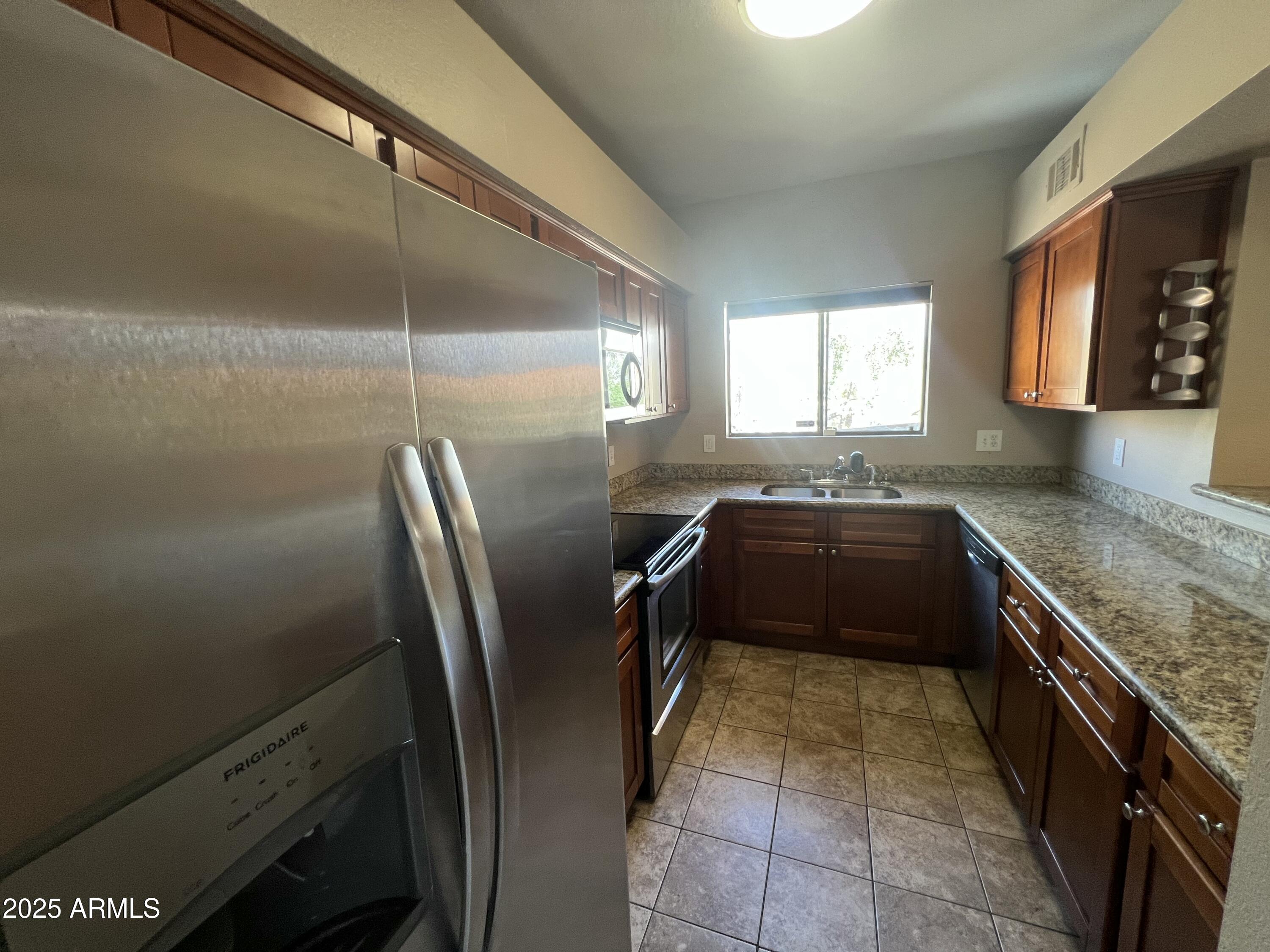 1287 North Alma School Road, Unit 201 Chandler, AZ 85224 - Photo 7 of 23 IMG_7006