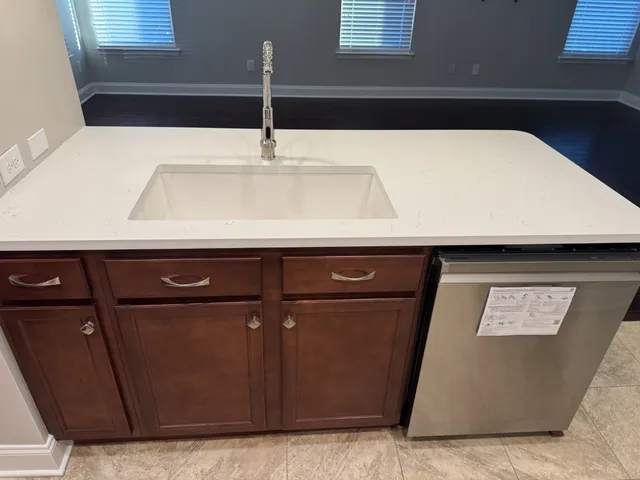 a view of a chandelier fan in a room