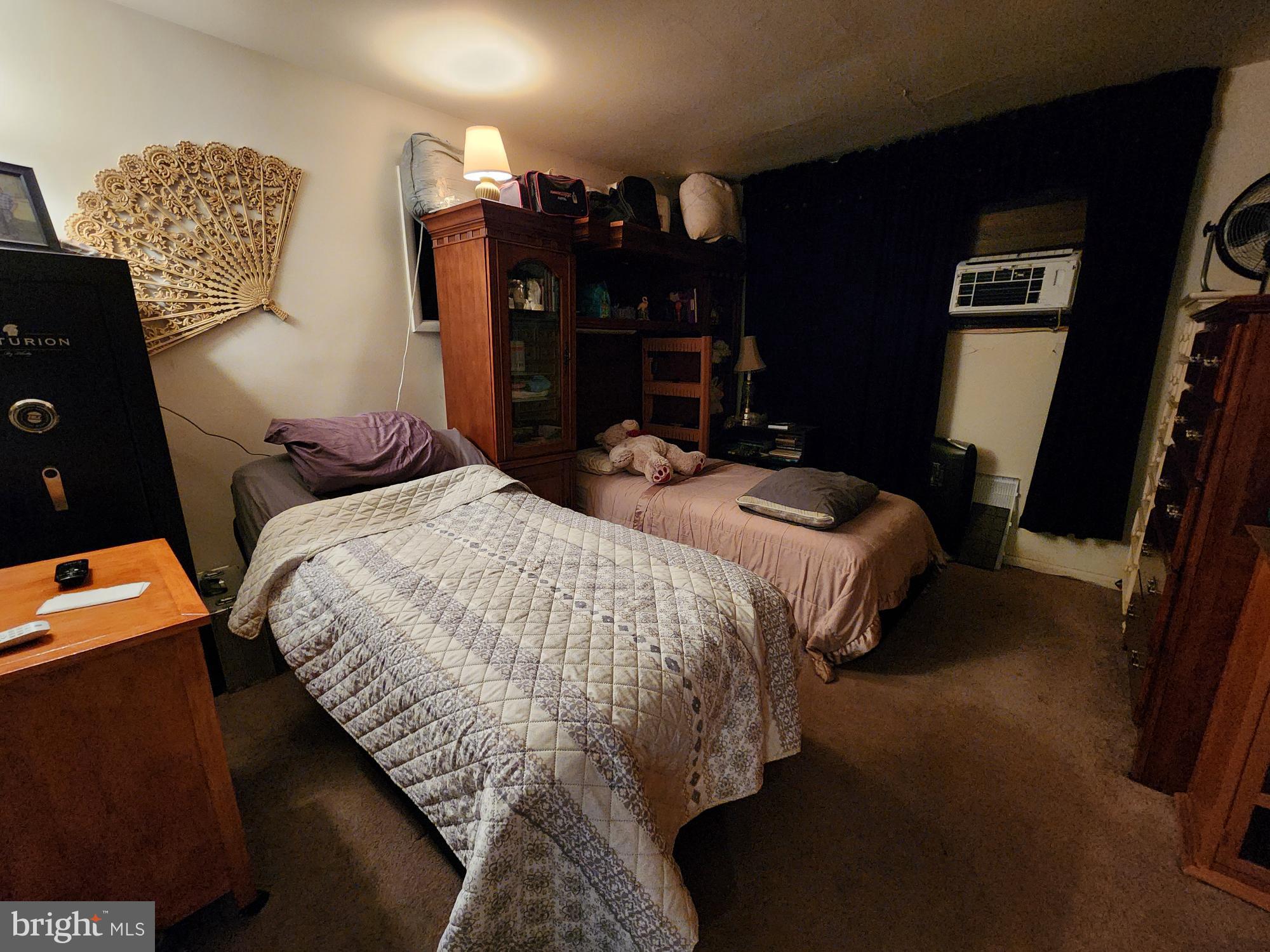 761 Wertzville Road Enola, PA 17025 - Photo 11 of 25 a bed sitting in a bedroom next to a window