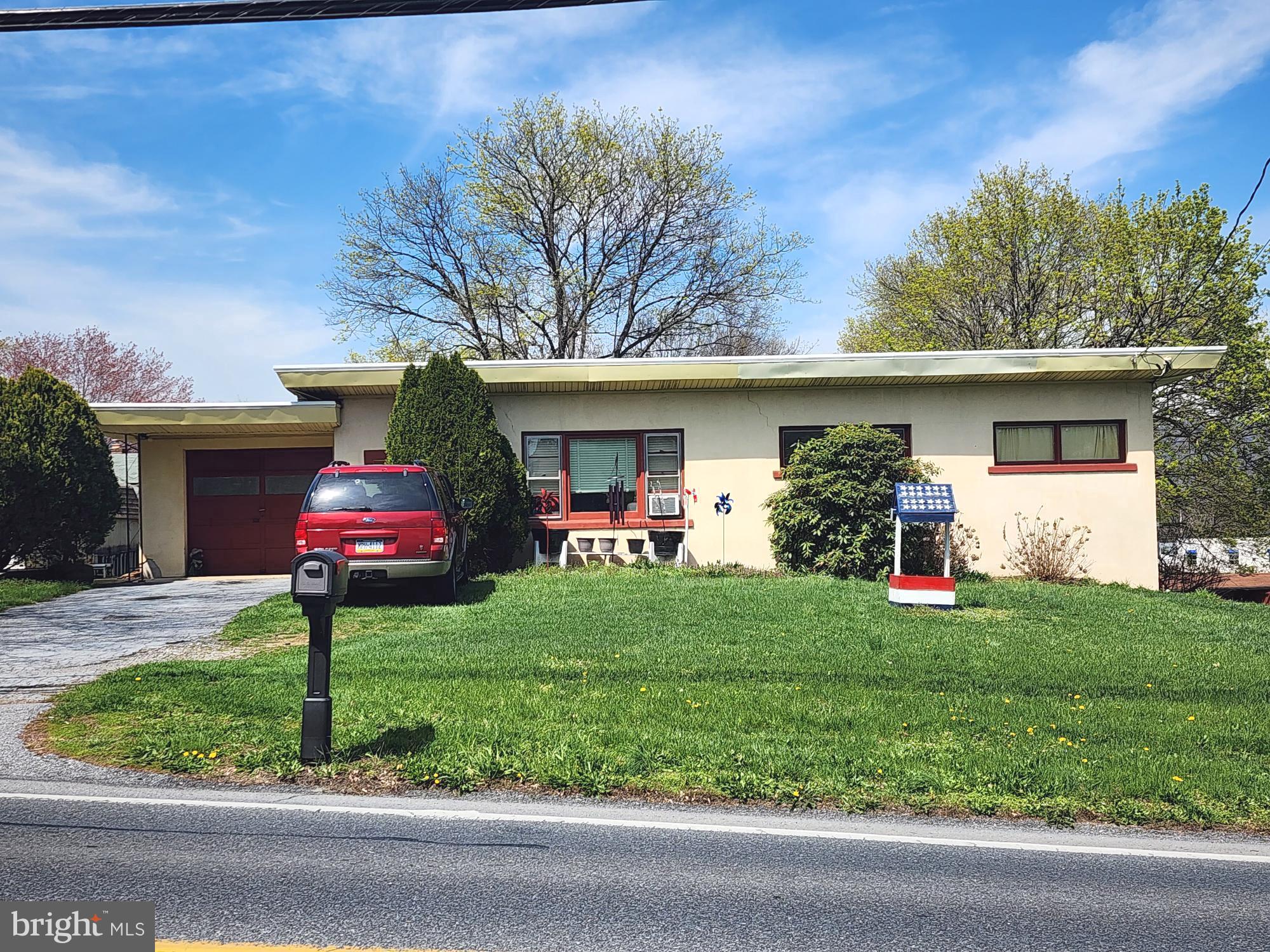 761 Wertzville Road Enola, PA 17025 - Photo 2 of 25 a front view of a house with garden