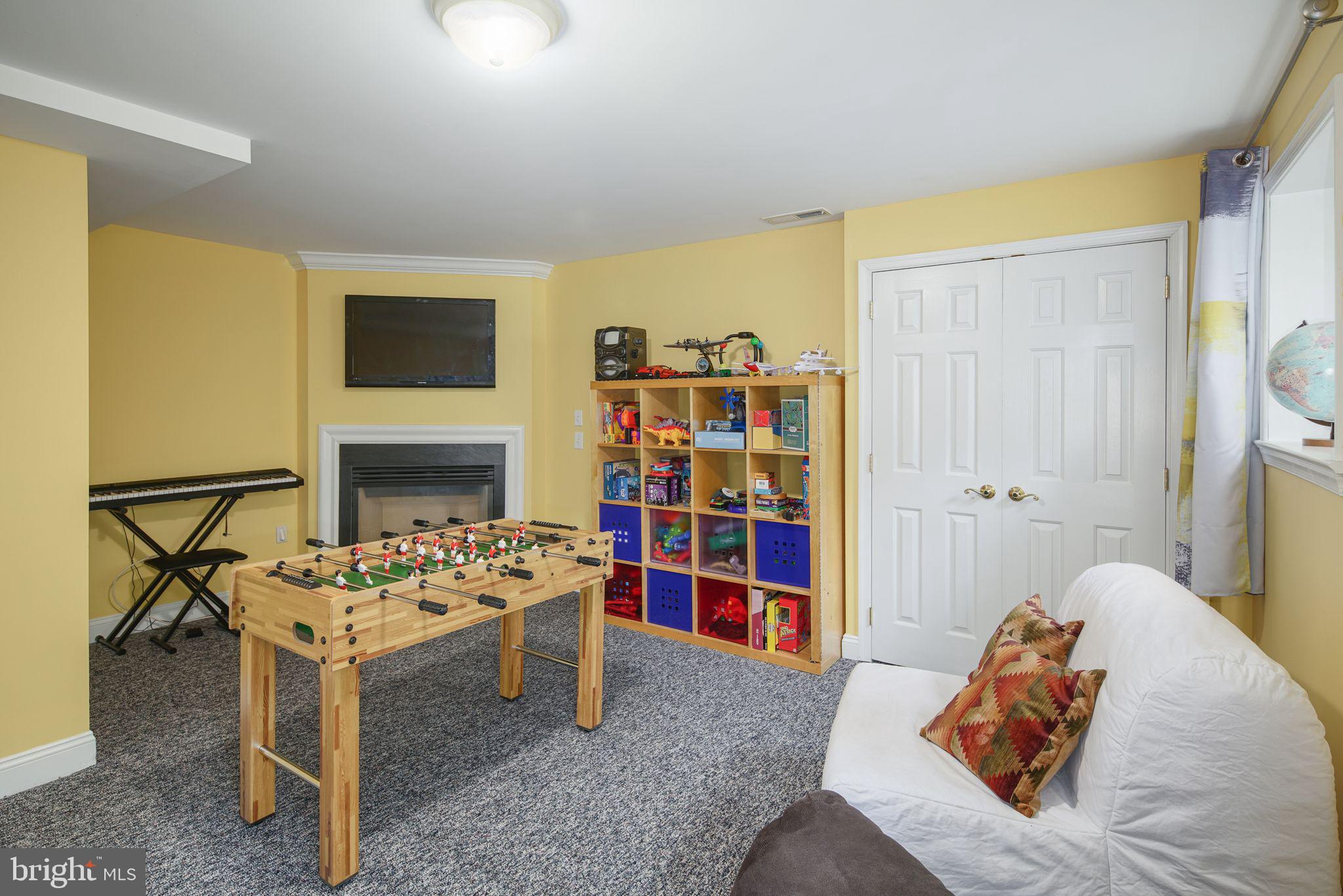 4 Valley View Road Rose Valley, PA 19063 - Photo 36 of 42 Lower Level Den with Gas Fireplace