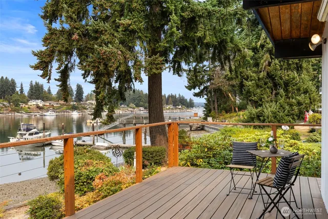 a view of a balcony with chairs