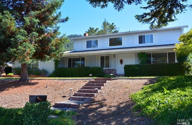 5755 Yerba Buena Road Santa Rosa, CA 95409 - Photo 1 of 1 front view of a house with a yard