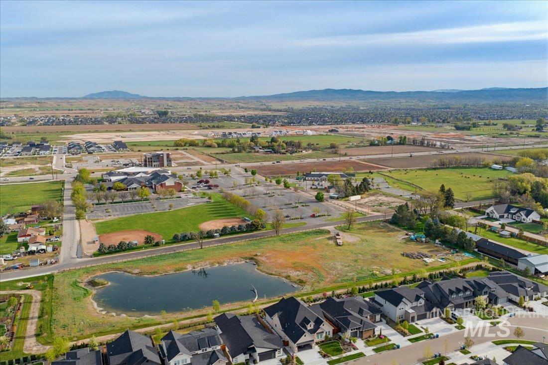 7595 West Moon Valley Road Eagle, ID 83616 - Photo 1 of 18 Aerial perspective of suburban area