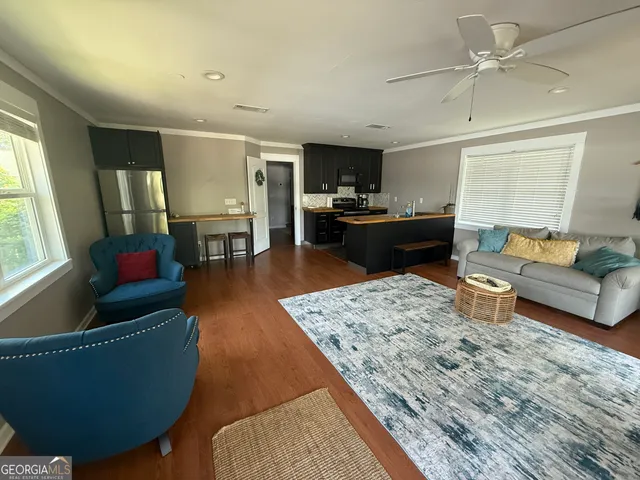 a living room with furniture and a couch