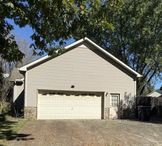 a view of backyard of house