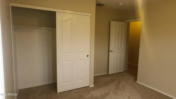 a view of small space with closet