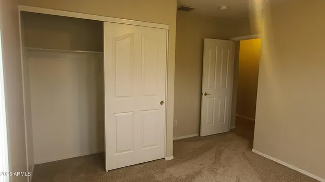 a view of small space with closet