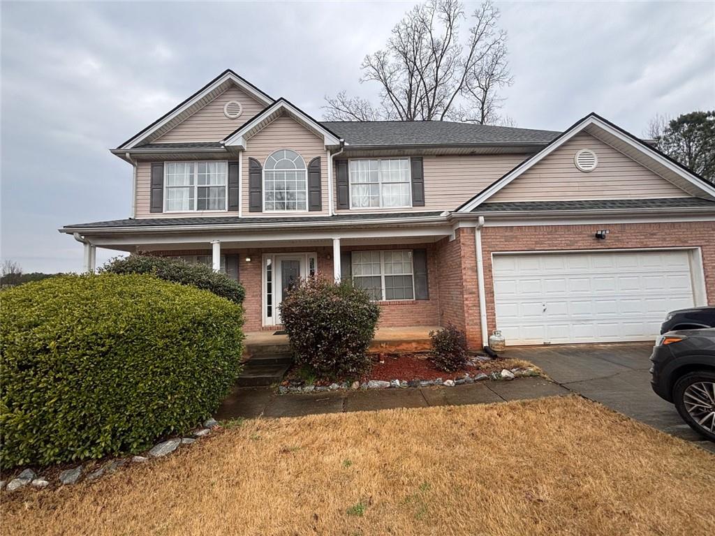 526 Canady Court Hampton, GA 30228 - Photo 1 of 10 a front view of a house with a yard