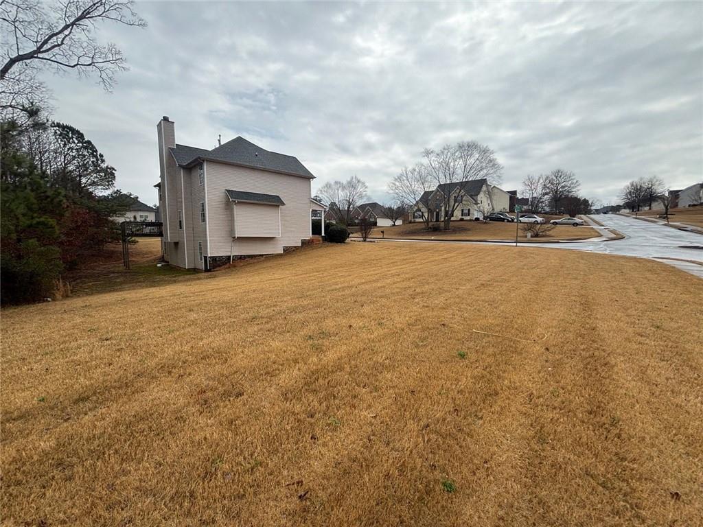 526 Canady Court Hampton, GA 30228 - Photo 2 of 10 a view of pool and mountain in the back yard