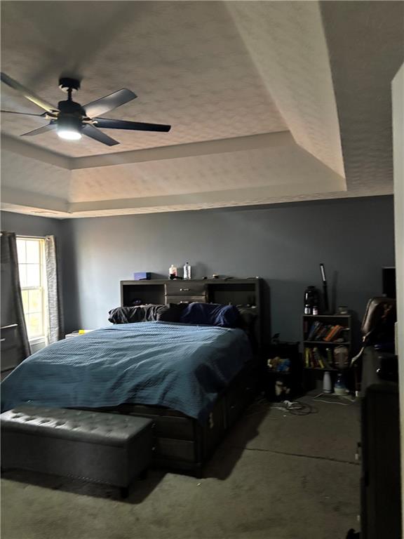 526 Canady Court Hampton, GA 30228 - Photo 7 of 10 a bedroom with a bed and a chandelier