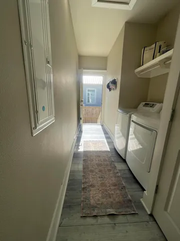 a view of a hallway with toilet