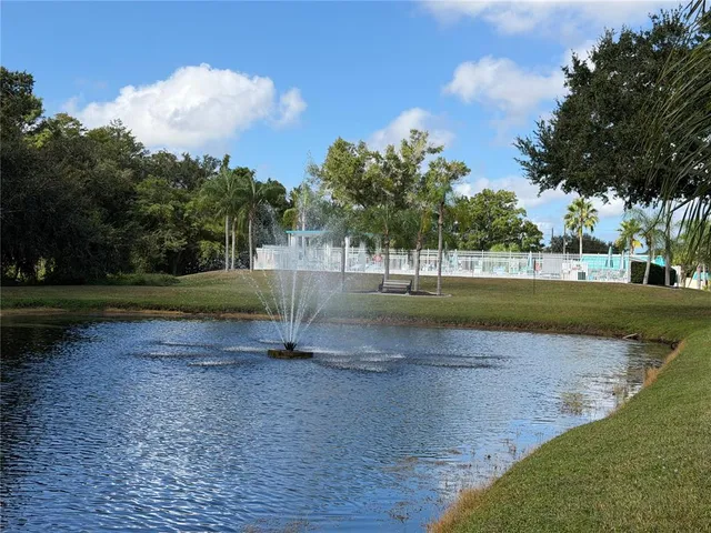 a view of bathroom with a shower and a sink