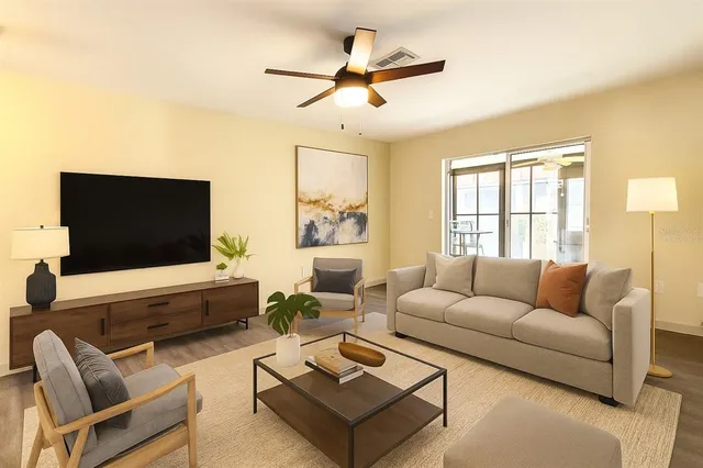 a bedroom with a bed and a couch