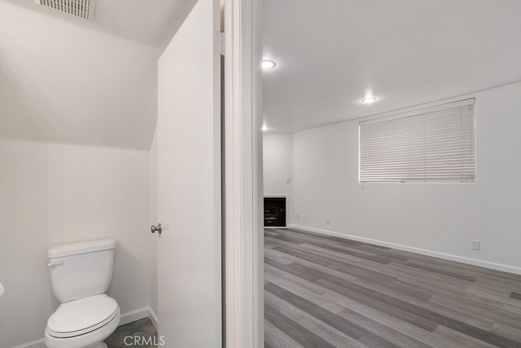 1434 South Point View Street Los Angeles, CA 90035 - Photo 6 of 16 a bathroom with a toilet and a shower