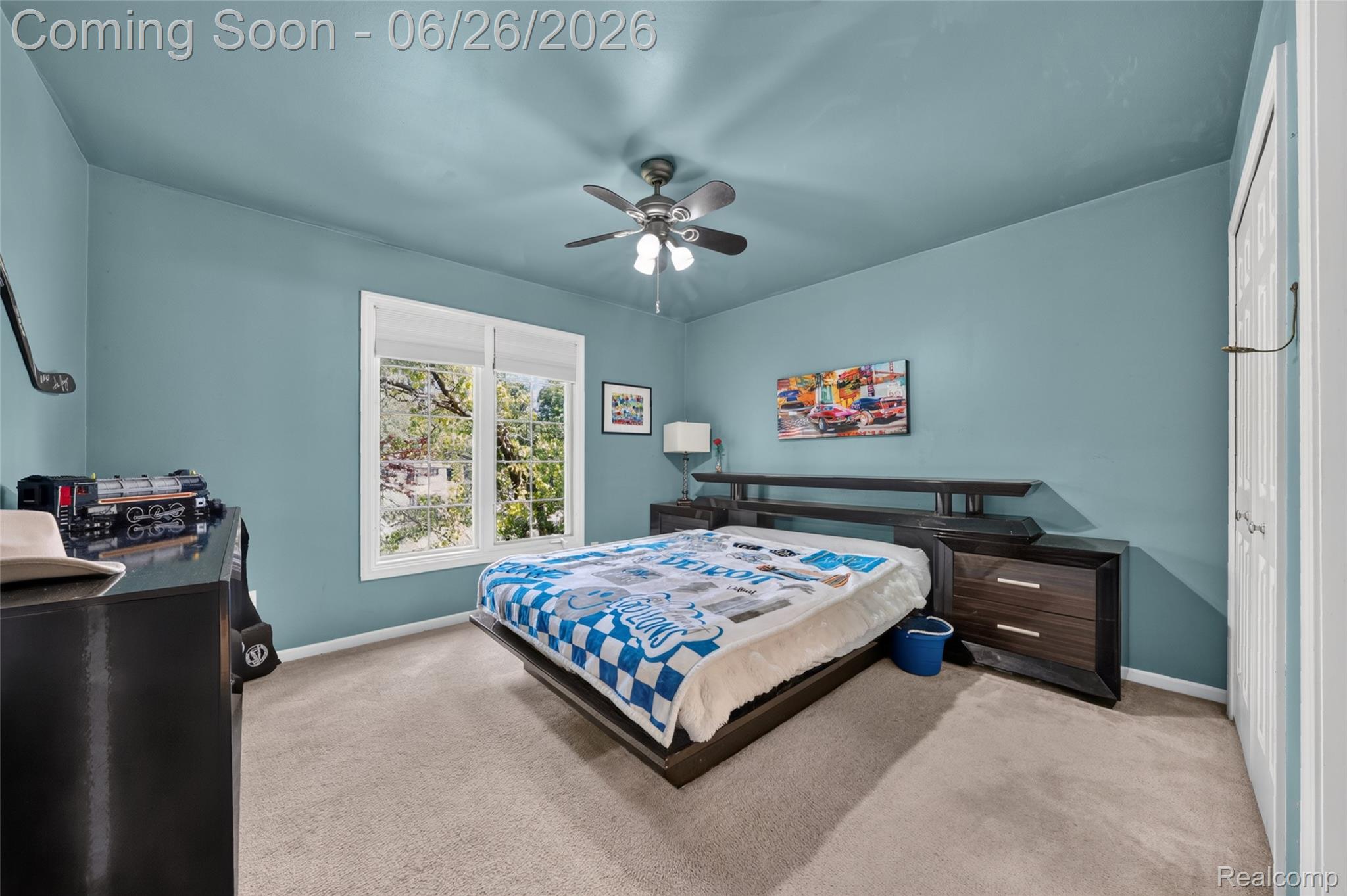 2619 Lambeth Park Rochester, MI 48306 - Photo 37 of 71 Carpeted room with a ceiling fan light fixture, double window with blinds, and white trim