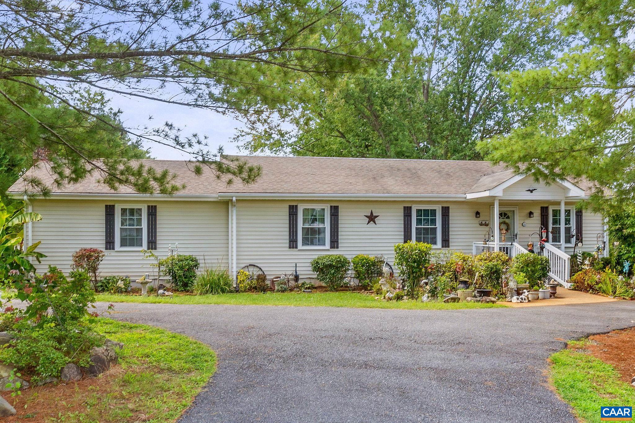 829 Cedar Grove Road Ruckersville, VA 22968 - Photo 3 of 42 front view of a house with a yard