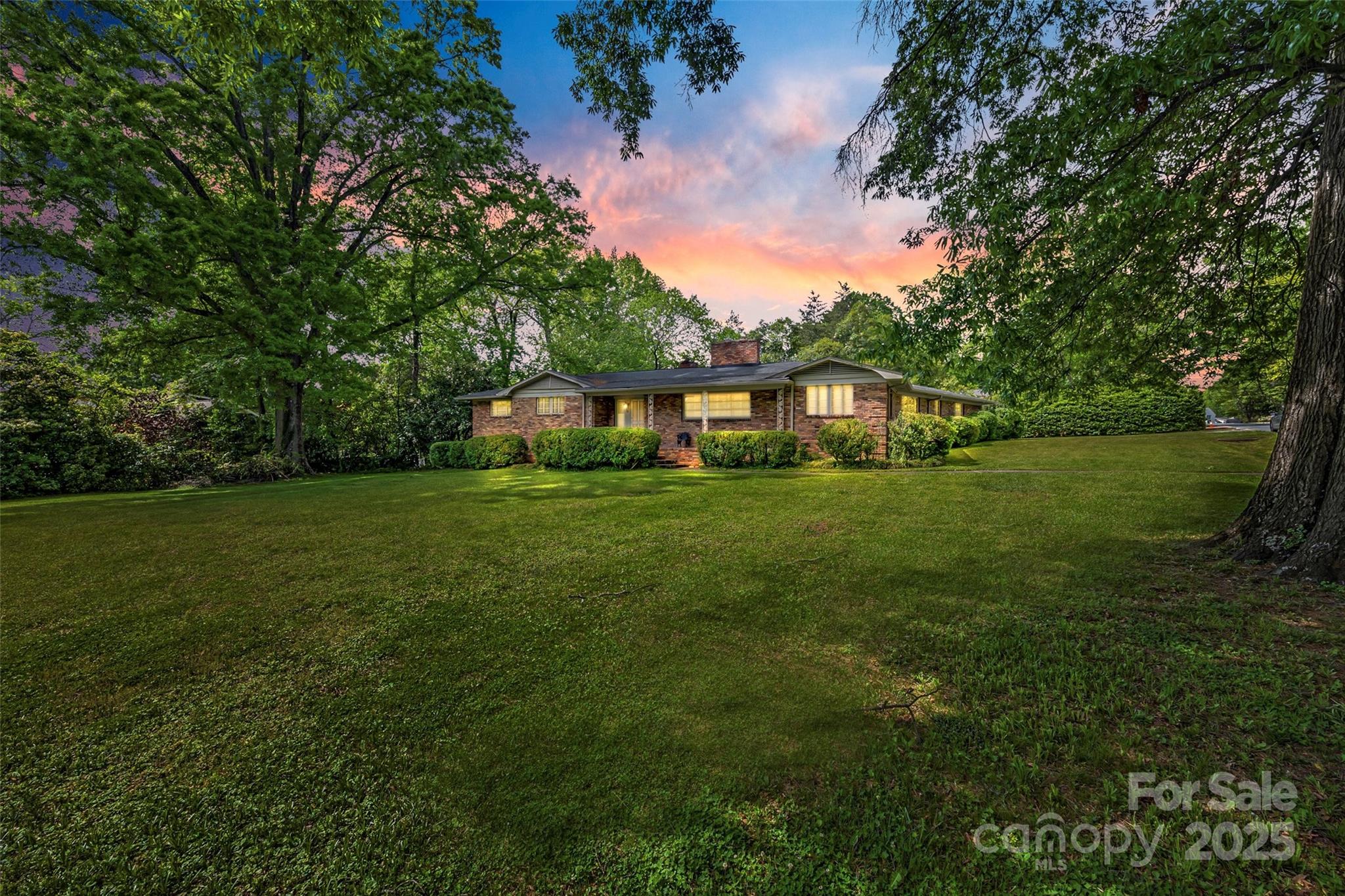 3330 Foxcroft Road Charlotte, NC 28211 - Photo 1 of 39 a house view with garden space