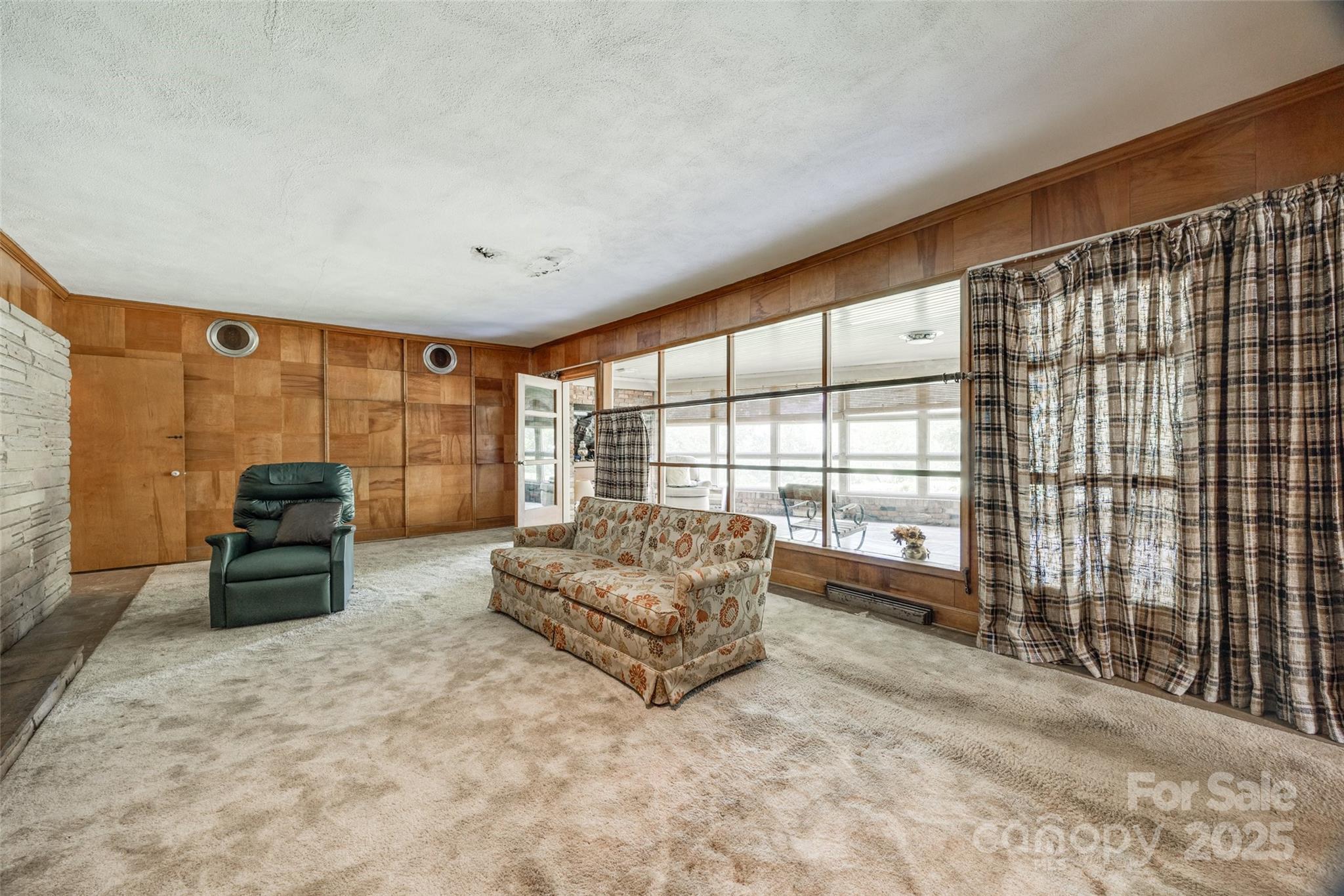 3330 Foxcroft Road Charlotte, NC 28211 - Photo 12 of 39 a spacious bedroom with a bed and a large window