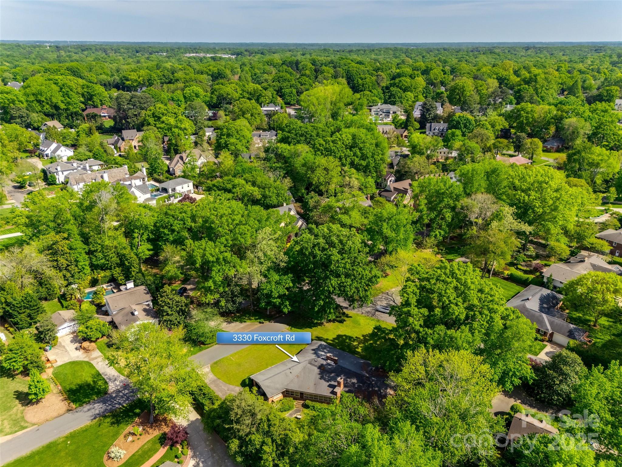 3330 Foxcroft Road Charlotte, NC 28211 - Photo 33 of 39 an aerial view of a house with a yard