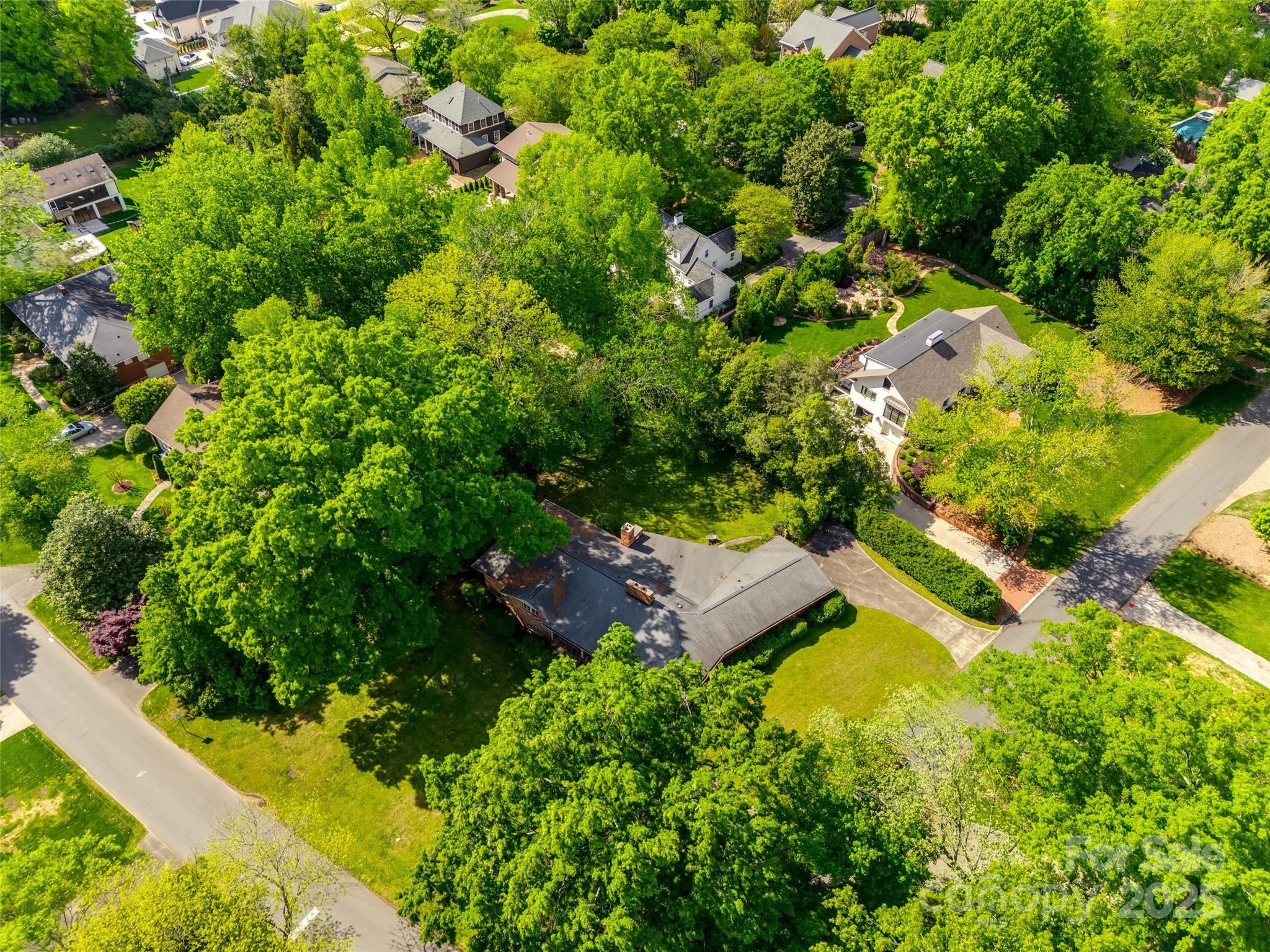 3330 Foxcroft Road Charlotte, NC 28211 - Photo 35 of 39 an aerial view of residential house with outdoor space and trees all around