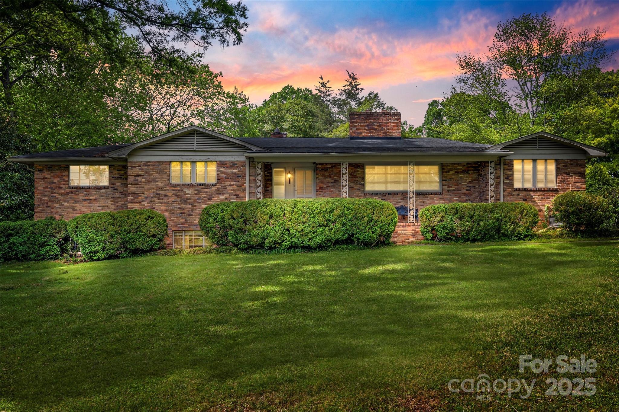 3330 Foxcroft Road Charlotte, NC 28211 - Photo 37 of 39 a front view of a house with a yard