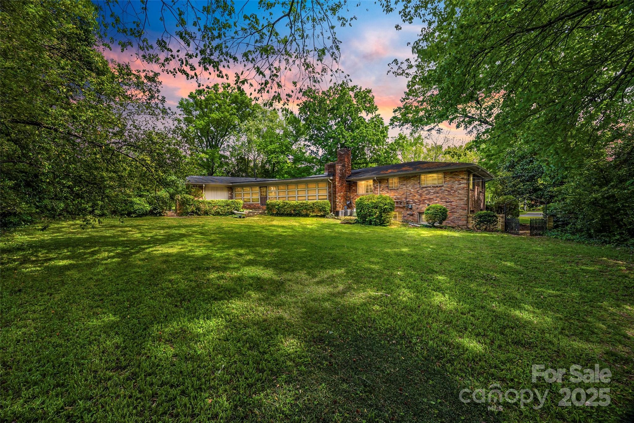 3330 Foxcroft Road Charlotte, NC 28211 - Photo 38 of 39 a view of house with backyard