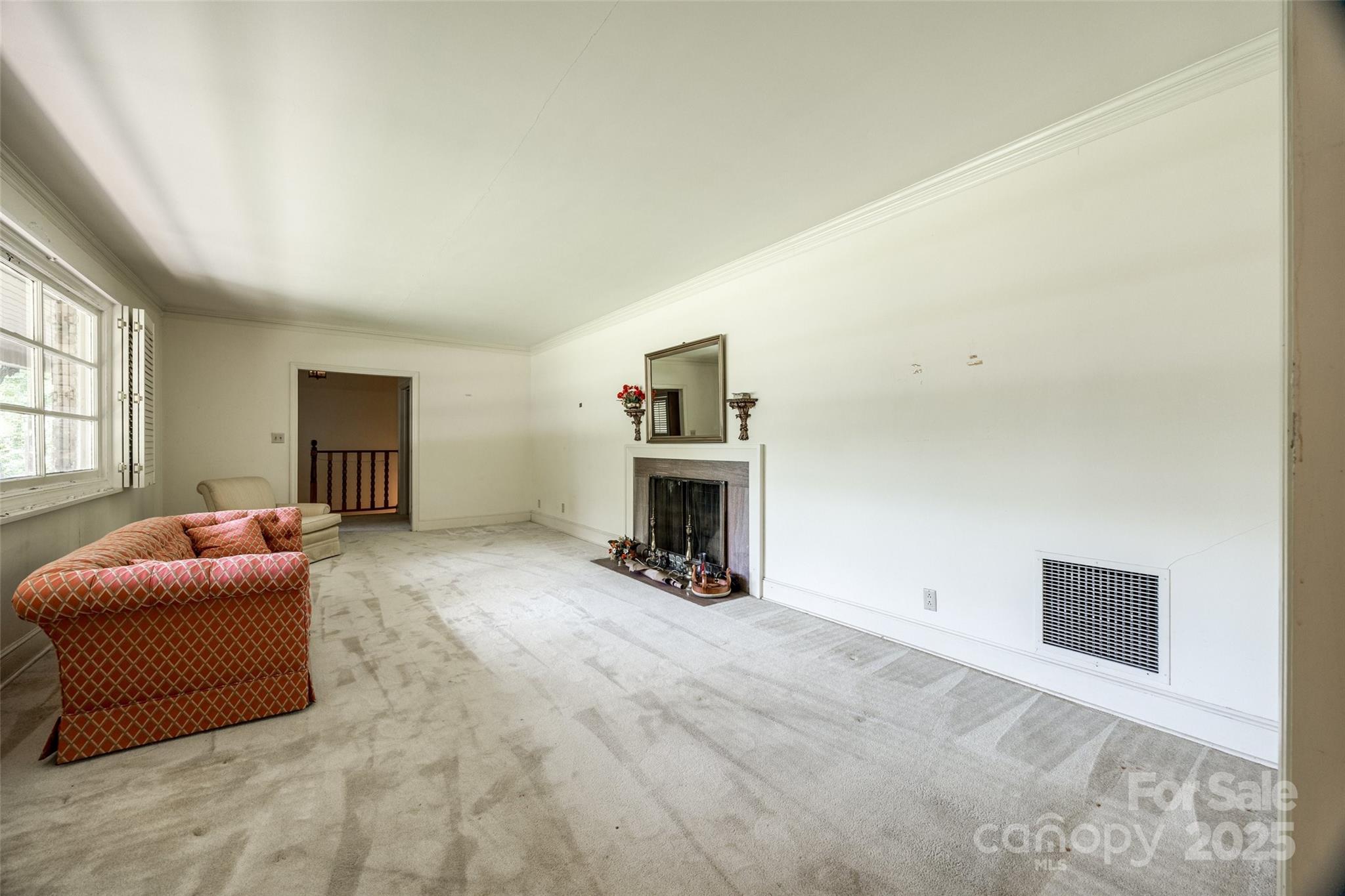 3330 Foxcroft Road Charlotte, NC 28211 - Photo 4 of 39 a living room with furniture and a fireplace