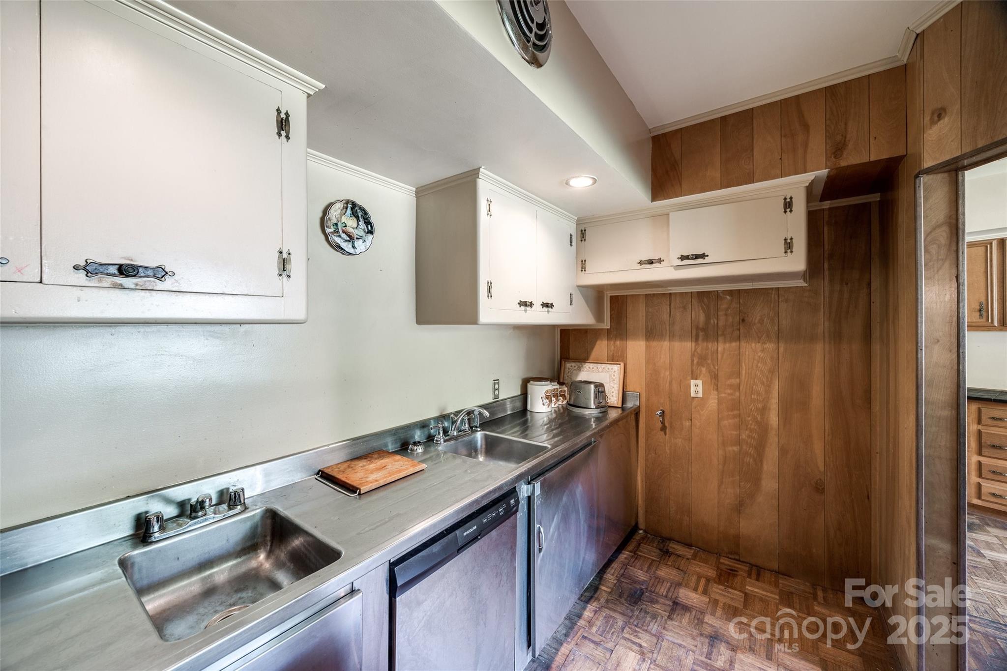 3330 Foxcroft Road Charlotte, NC 28211 - Photo 7 of 39 a kitchen with a refrigerator and a stove