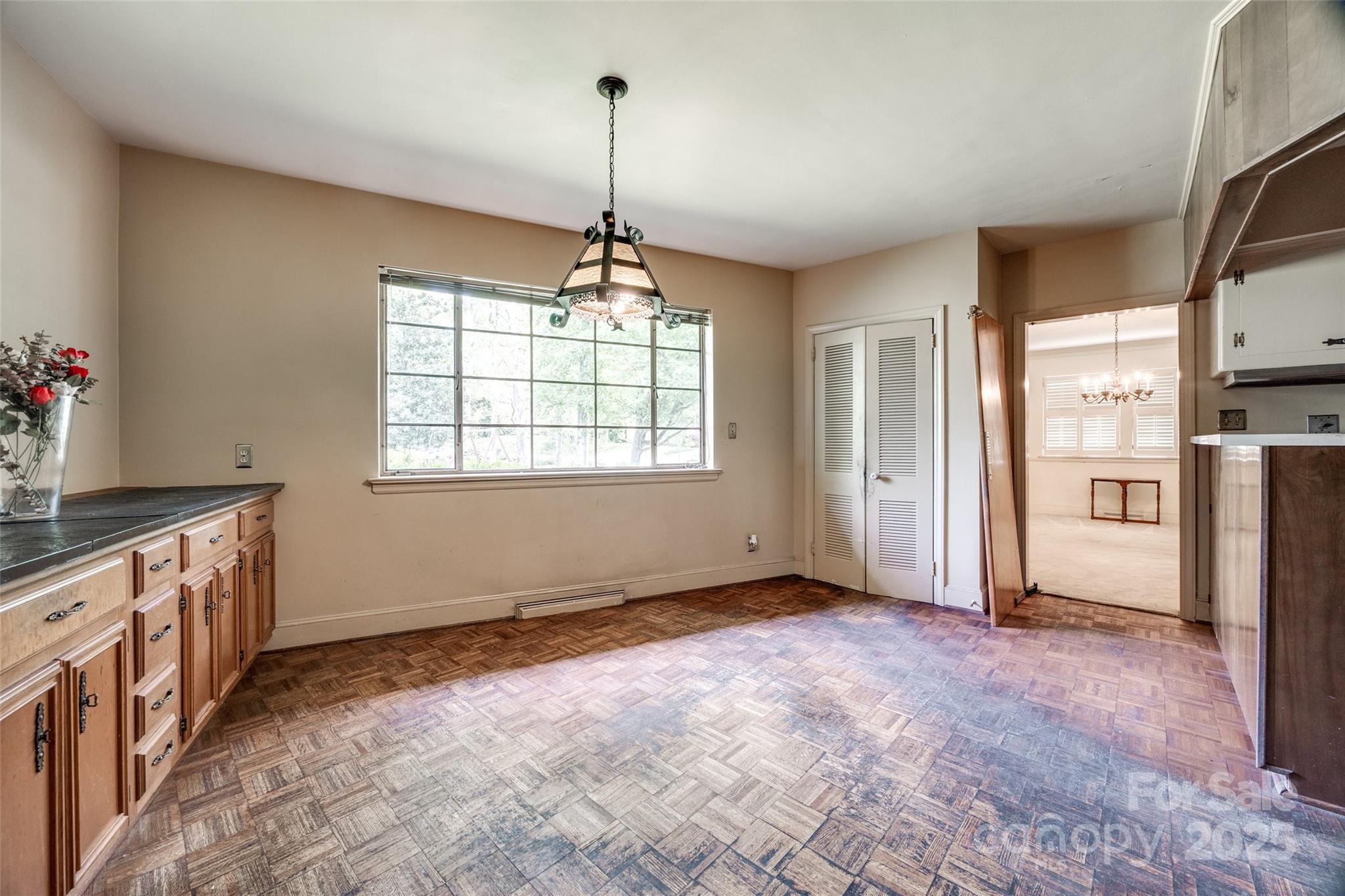 3330 Foxcroft Road Charlotte, NC 28211 - Photo 9 of 39 a view of an empty room with a window