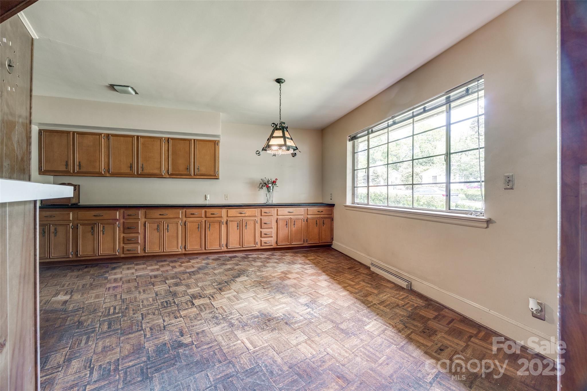 3330 Foxcroft Road Charlotte, NC 28211 - Photo 10 of 39 a view of a kitchen with a sink and cabinets
