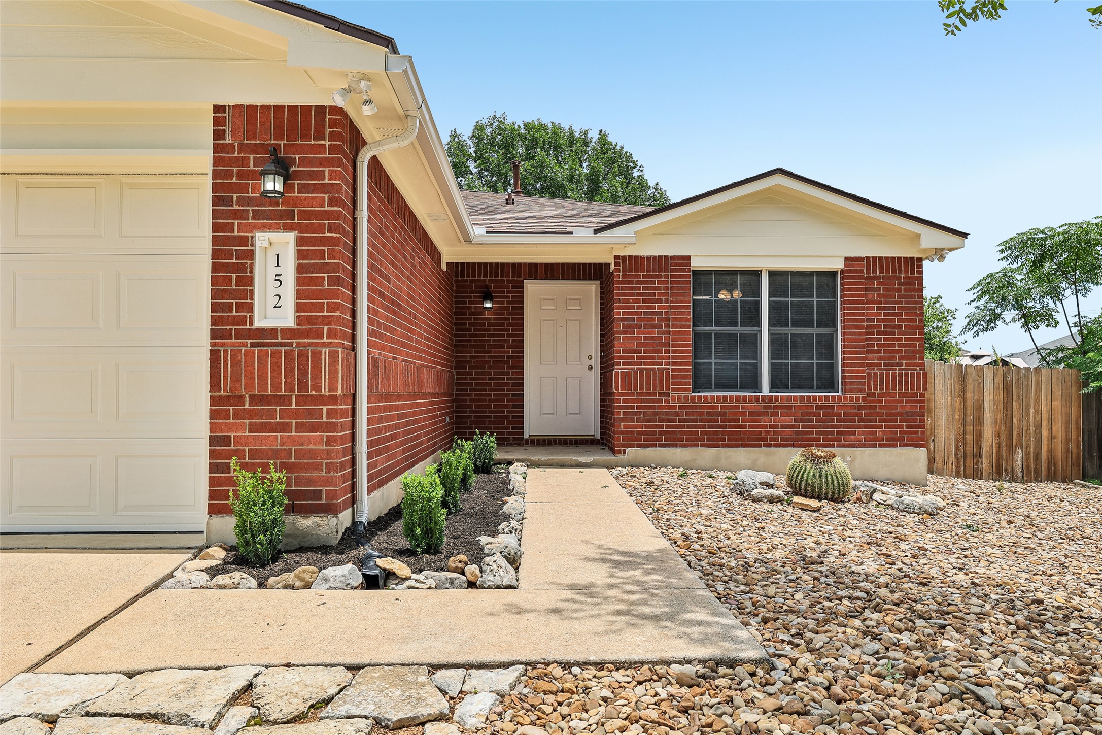 152 Grant Way Kyle, TX 78640 - Photo 7 of 39 a front view of a house