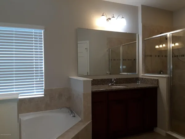 a bathroom with a sink and a bathtub