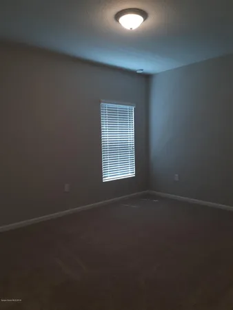 a house with garden in front of it