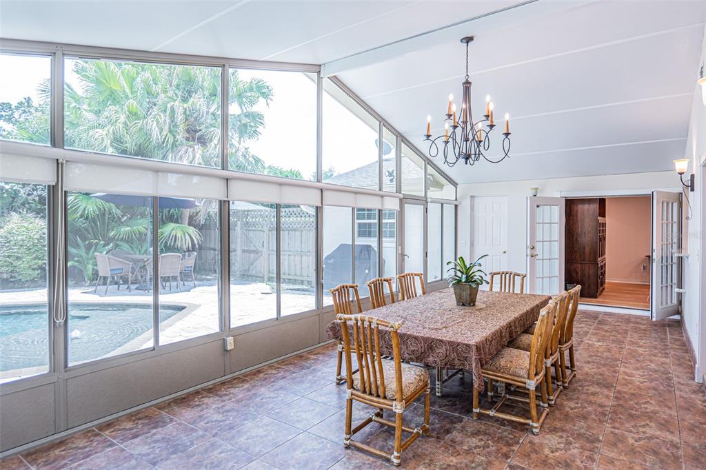 741 Brookside Road Maitland, FL 32751 - Photo 15 of 43 a view of a dining room with furniture window and outside view