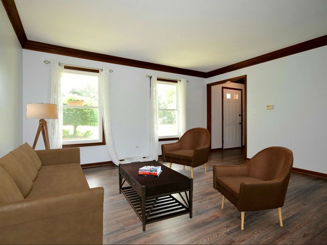 S950 Spring Green Way Batavia, IL 60510 - Photo 3 of 25 a living room with furniture and a window