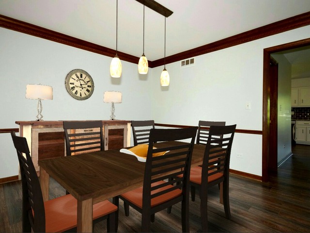 S950 Spring Green Way Batavia, IL 60510 - Photo 4 of 25 a view of a dining area with furniture and wooden floor
