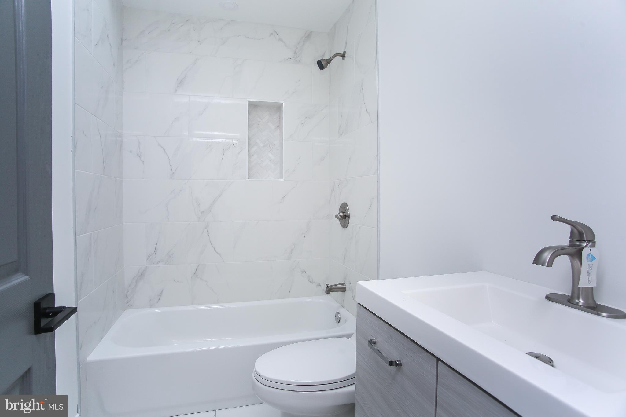 5707 Nassau Road Philadelphia, PA 19131 - Photo 17 of 22 Hallway Bathroom