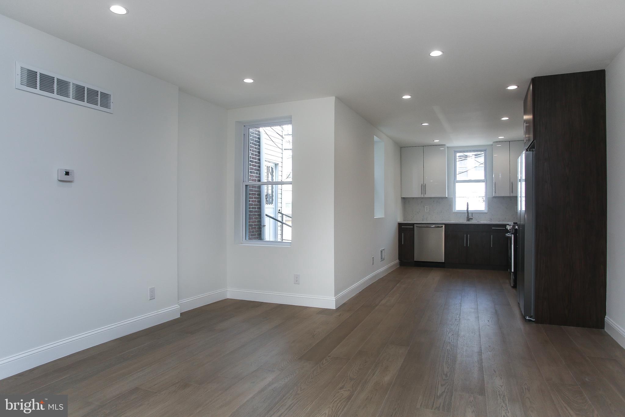 5707 Nassau Road Philadelphia, PA 19131 - Photo 8 of 22 View of Kitchen from Living Room