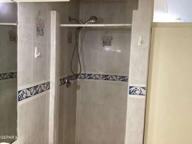 a close view of a shower in a bathroom