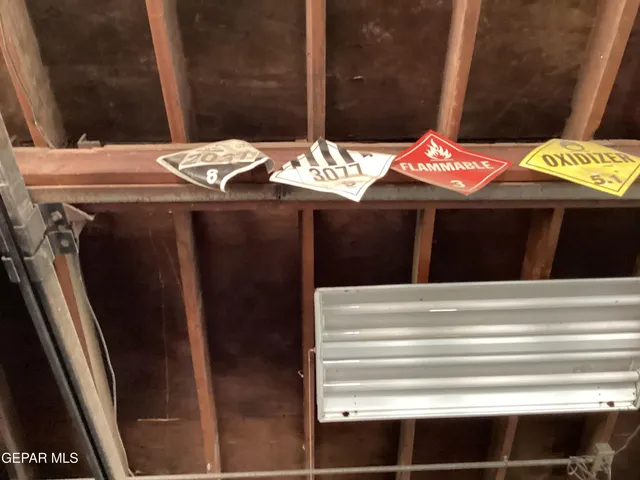a bathroom with a sink and a large mirror